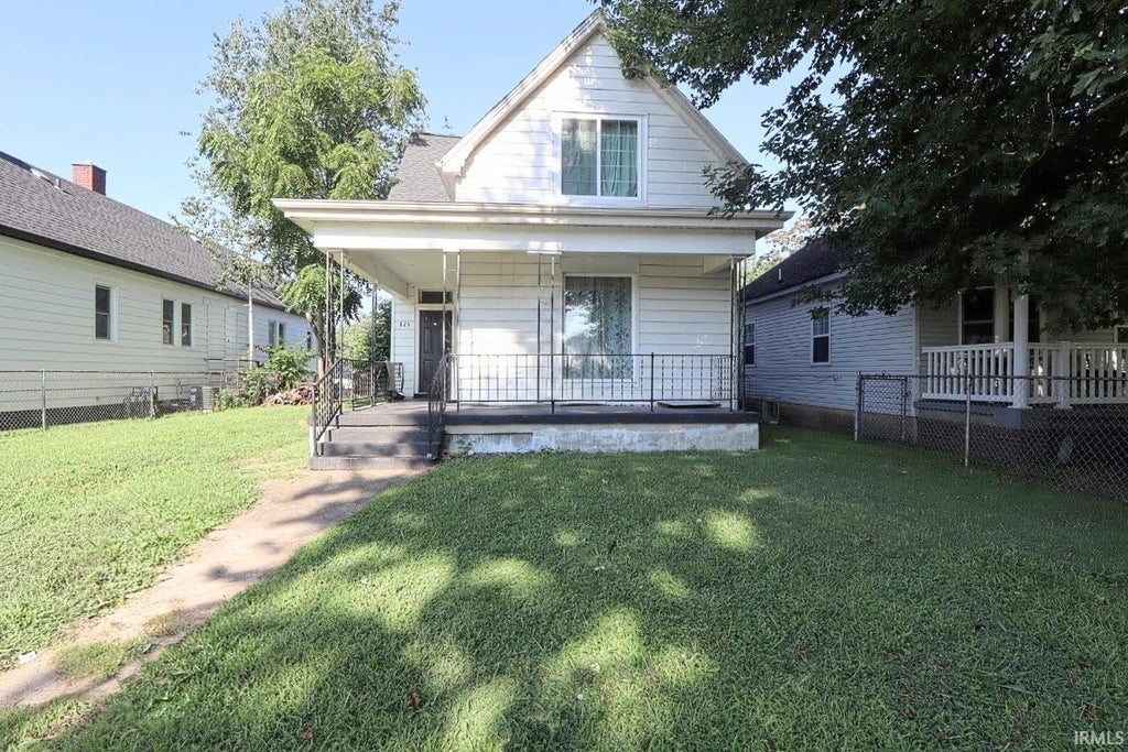 Photo of 825 S Garvin Street, Evansville, IN 47713 (MLS # 202631614)