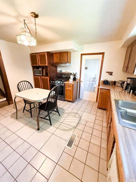 Tiny photo for 501 W 2ND Avenue, Garrett, IN 46738 (MLS # 202635198)
