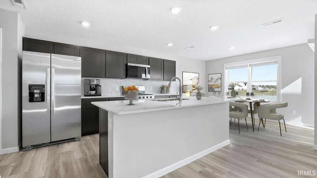 Photo of 1421 Greencastle Drive, Warsaw, IN 46582 (MLS # 202610021)