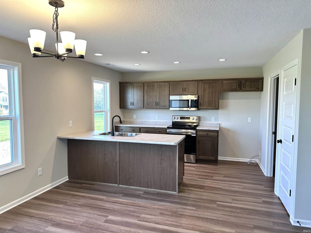 Photo of 6327 Hunter Wood Drive, Fort Wayne, IN 46835 (MLS # 202604553)