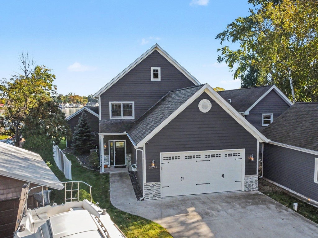 Photo of 51244 N Shore Drive, Elkhart, IN 46514 (MLS # 202643633)
