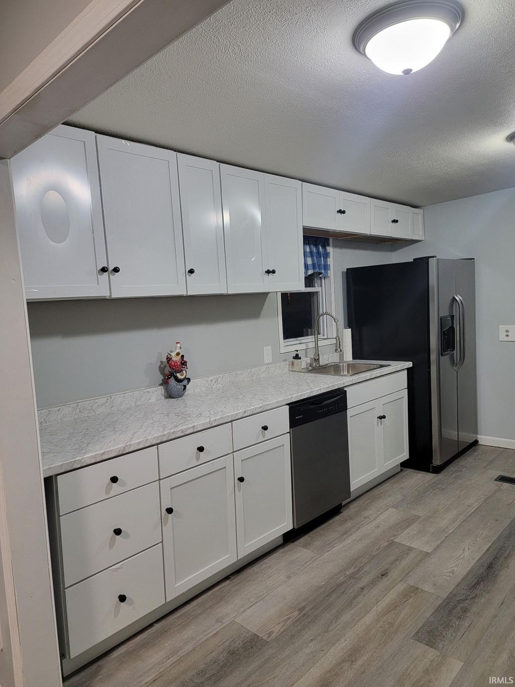 Photo of 623 W Grissom Avenue, Mitchell, IN 47446 (MLS # 202608221)