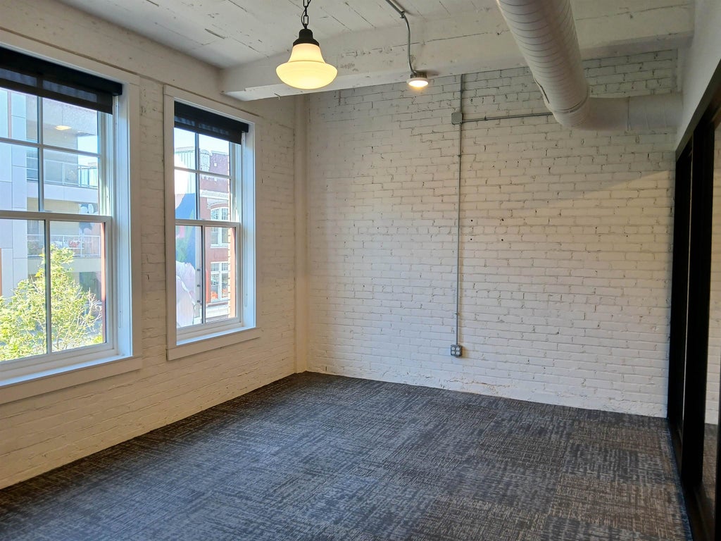 Photo of 116 W Columbia Street #301, Fort Wayne, IN 46802 (MLS # 202624215)