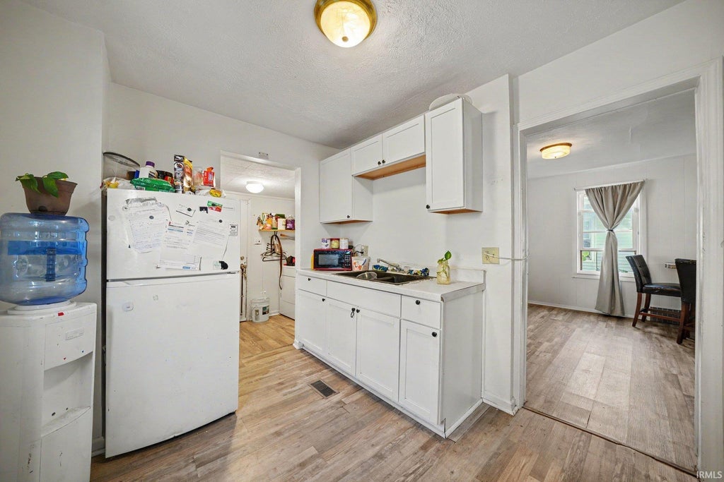 Photo of 1518 WEBSTER Street, South Bend, IN 46613 (MLS # 202640913)