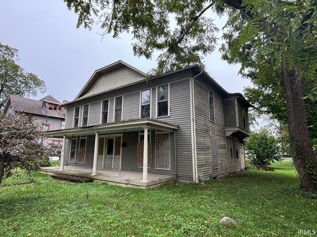 Photo of 409 W 10Th Street, Anderson, IN 46016 (MLS # 202643285)