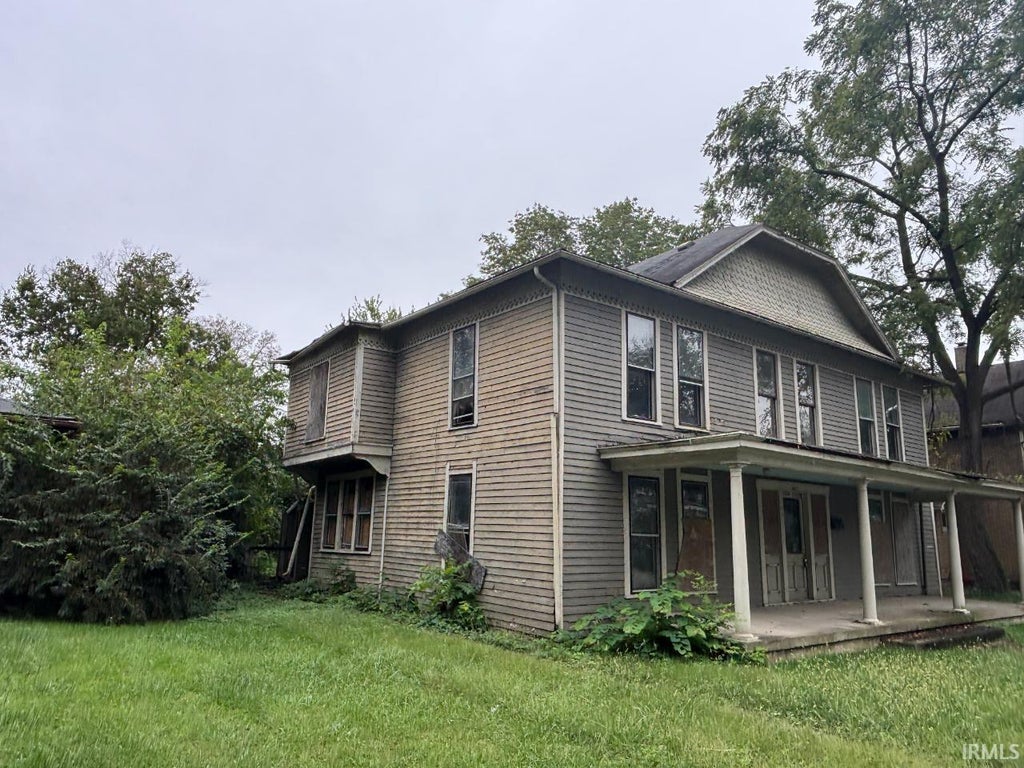 Photo of 409 W 10Th Street, Anderson, IN 46016 (MLS # 202643285)