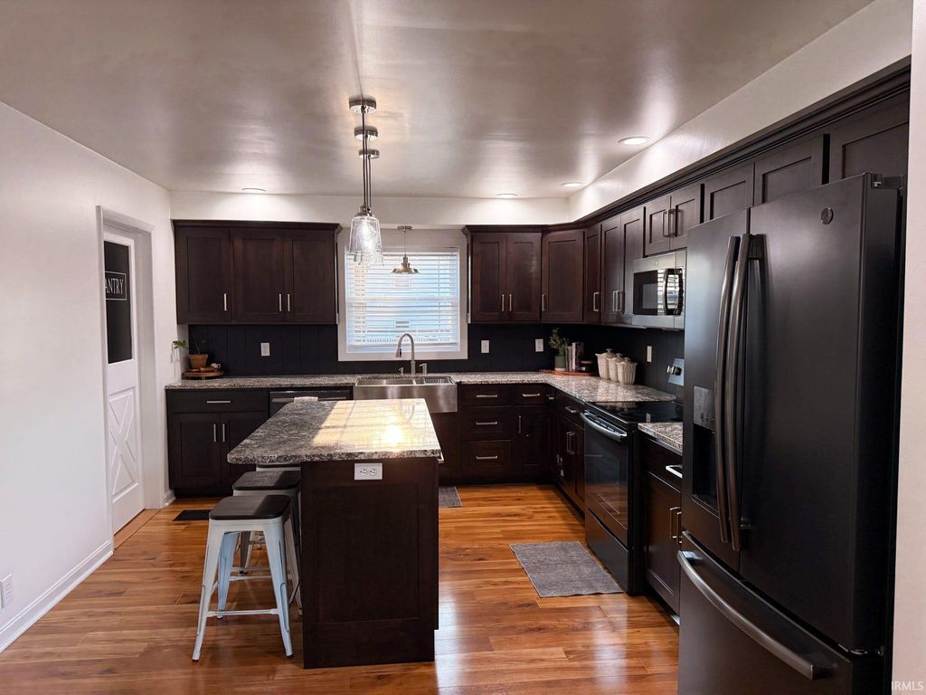 Photo of 100 Elm Street, Cannelburg, IN 47519 (MLS # 202612810)