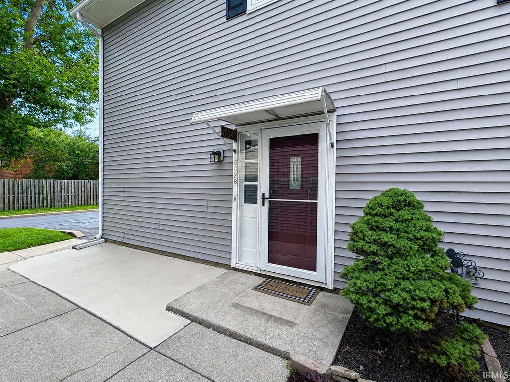 Photo of 5026 Woodmark Drive, Fort Wayne, IN 46815 (MLS # 202632629)