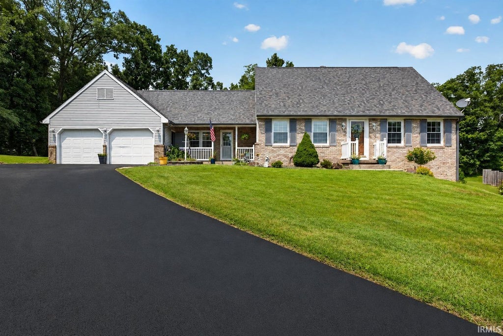 Photo of 1243 Bellgrade Avenue, Loogootee, IN 47553 (MLS # 202630675)