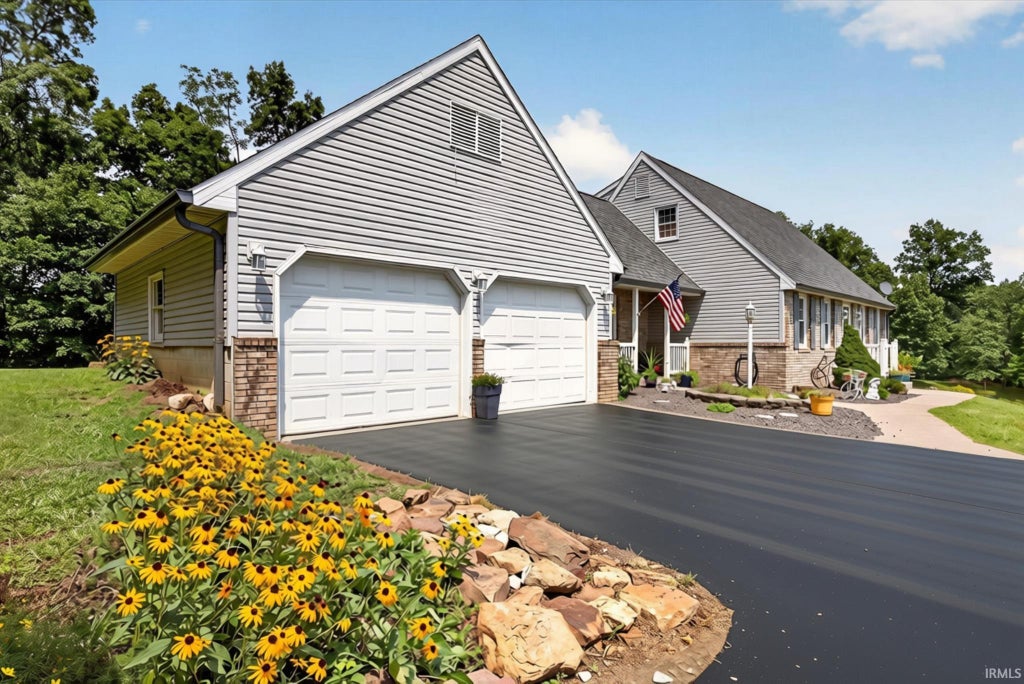 Photo of 1243 Bellgrade Avenue, Loogootee, IN 47553 (MLS # 202630675)