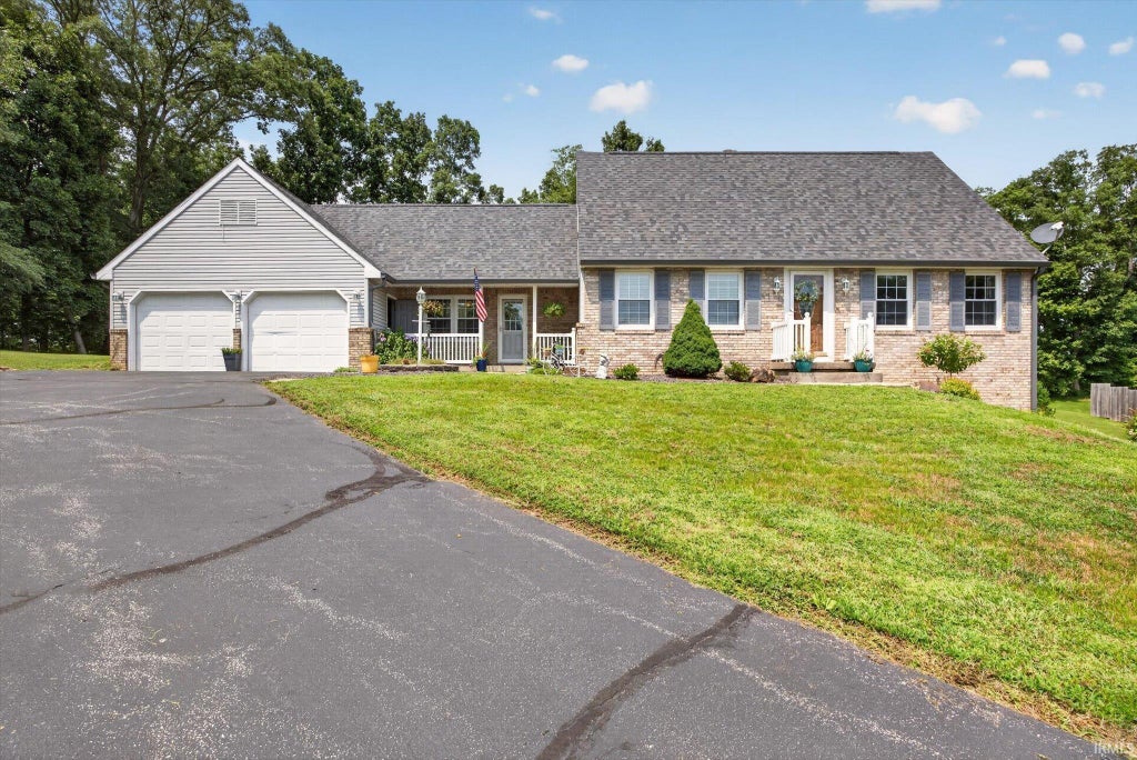 Photo of 1243 Bellgrade Avenue, Loogootee, IN 47553 (MLS # 202630675)