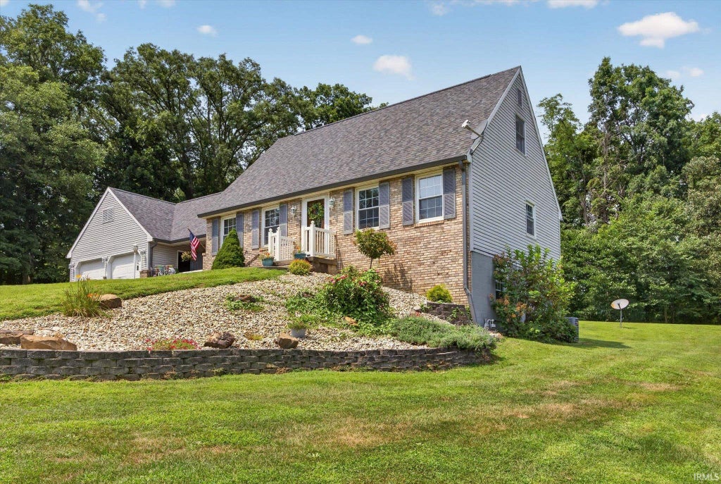 Photo of 1243 Bellgrade Avenue, Loogootee, IN 47553 (MLS # 202630675)