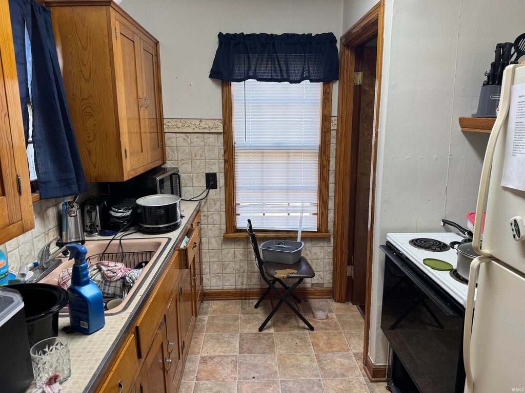 Photo of 911 W williams Street, Oakland City, IN 47670 (MLS # 202641649)