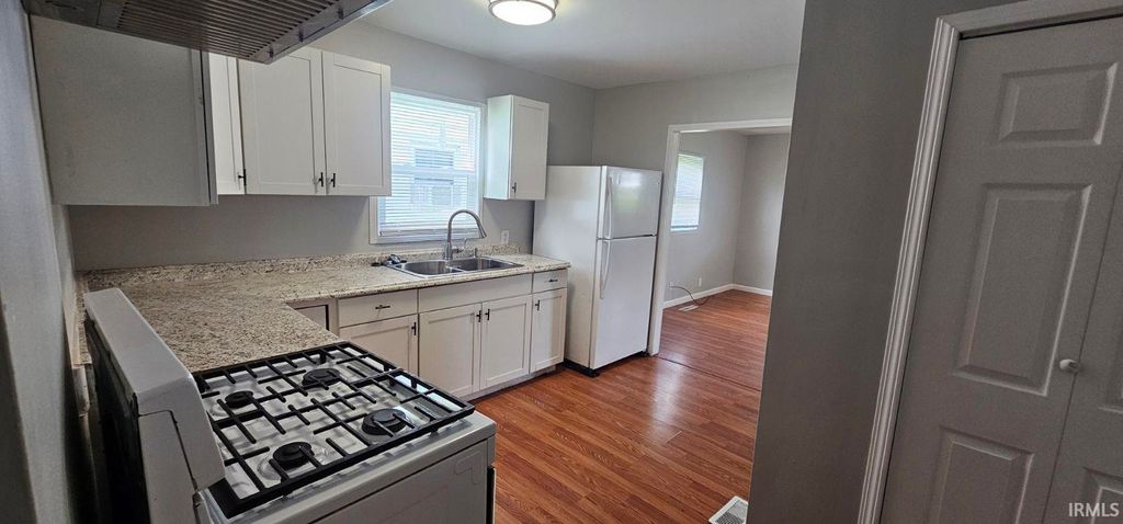 Photo of 110 N Wellington Street, Elkhart, IN 46619 (MLS # 202627796)