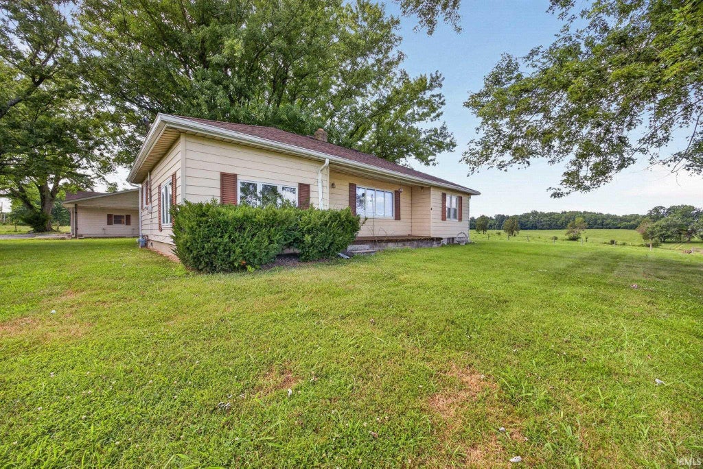 Photo of 3931 W State Road 45 Highway, Solsberry, IN 47459 (MLS # 202630347)