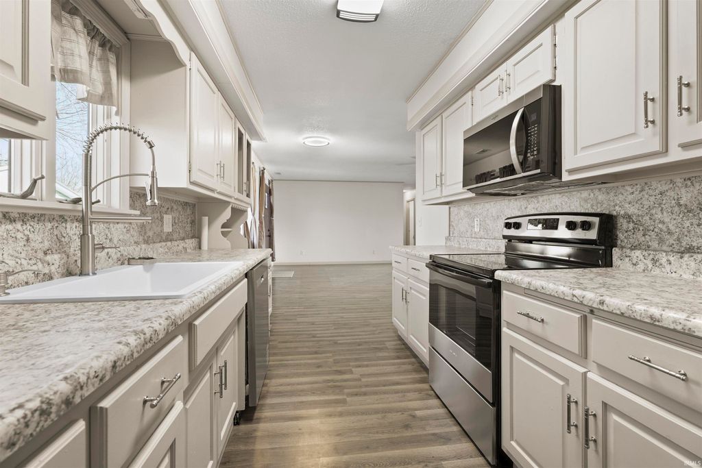 Photo of 201 N Garrison Street, Ashley, IN 46705 (MLS # 202602863)