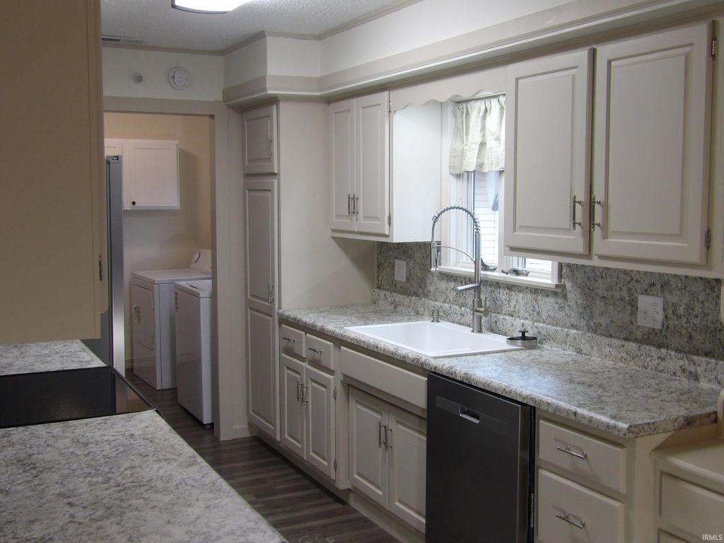 Photo of 201 N Garrison Street, Ashley, IN 46705 (MLS # 202602863)