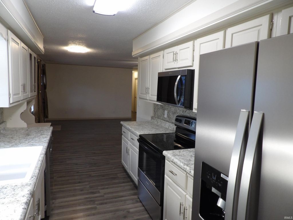 Photo of 201 N Garrison Street, Ashley, IN 46705 (MLS # 202602863)