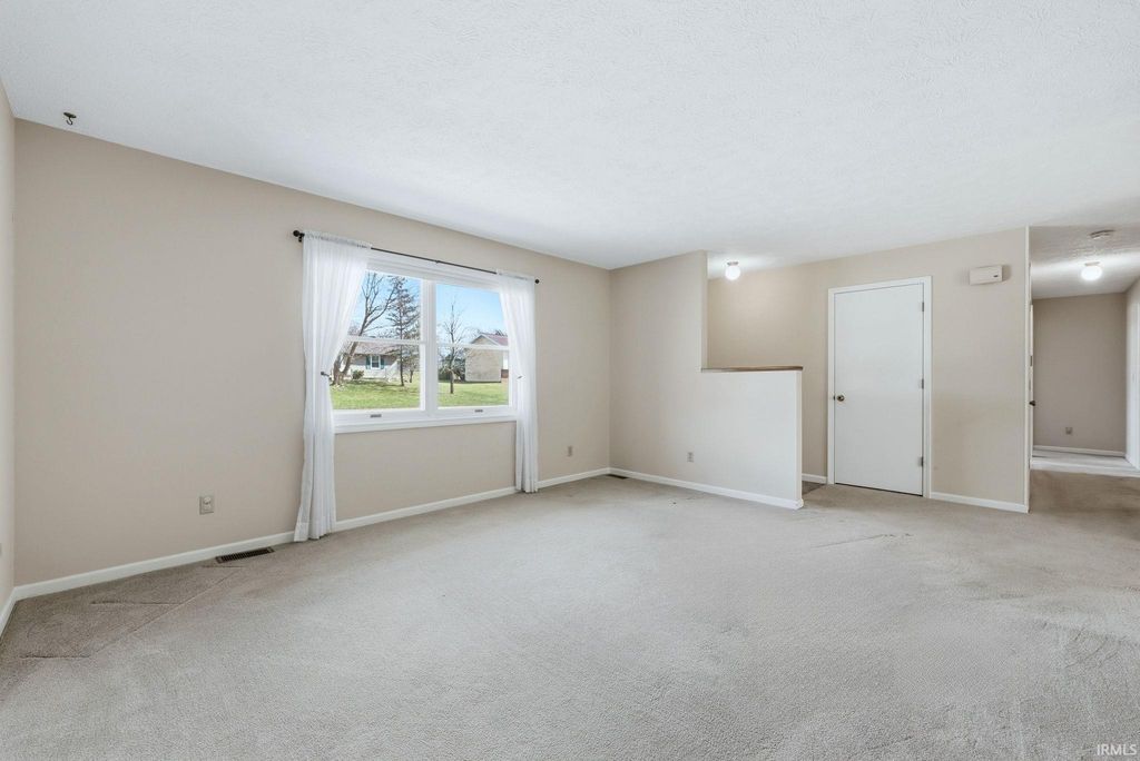 Photo of 2704 Huffman Street, Winona Lake, IN 46590 (MLS # 202608464)