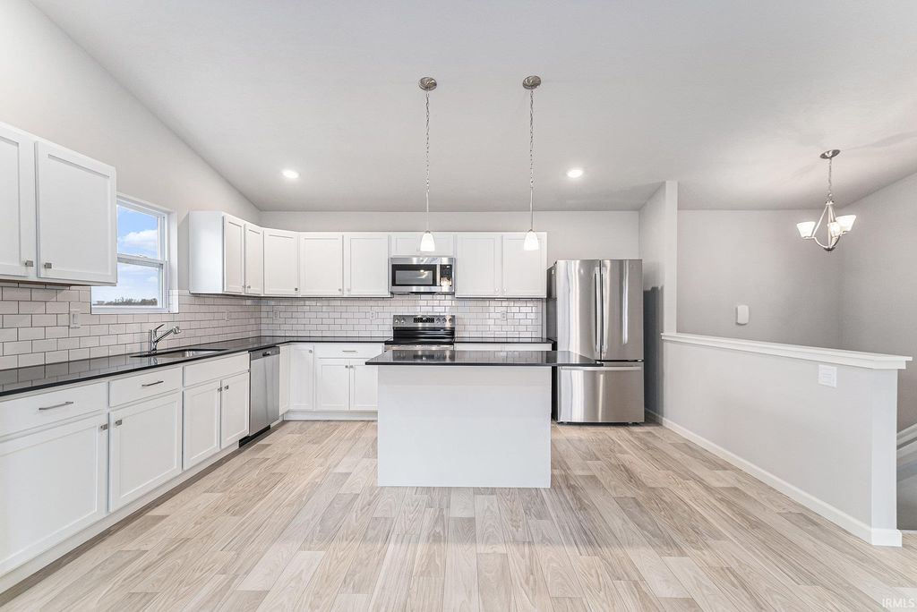 Photo of 50719 Hunters Edge Trail, Elkhart, IN 46514 (MLS # 202602663)