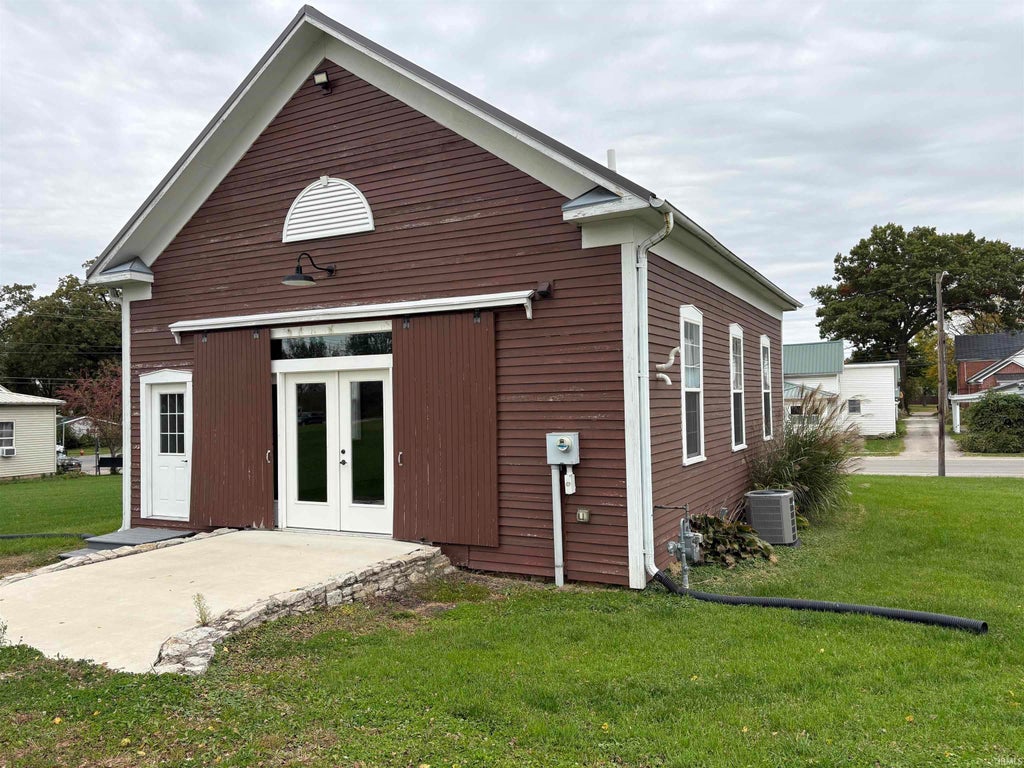 Photo of 200 E Shackley Street, Geneva, IN 46740 (MLS # 202641977)