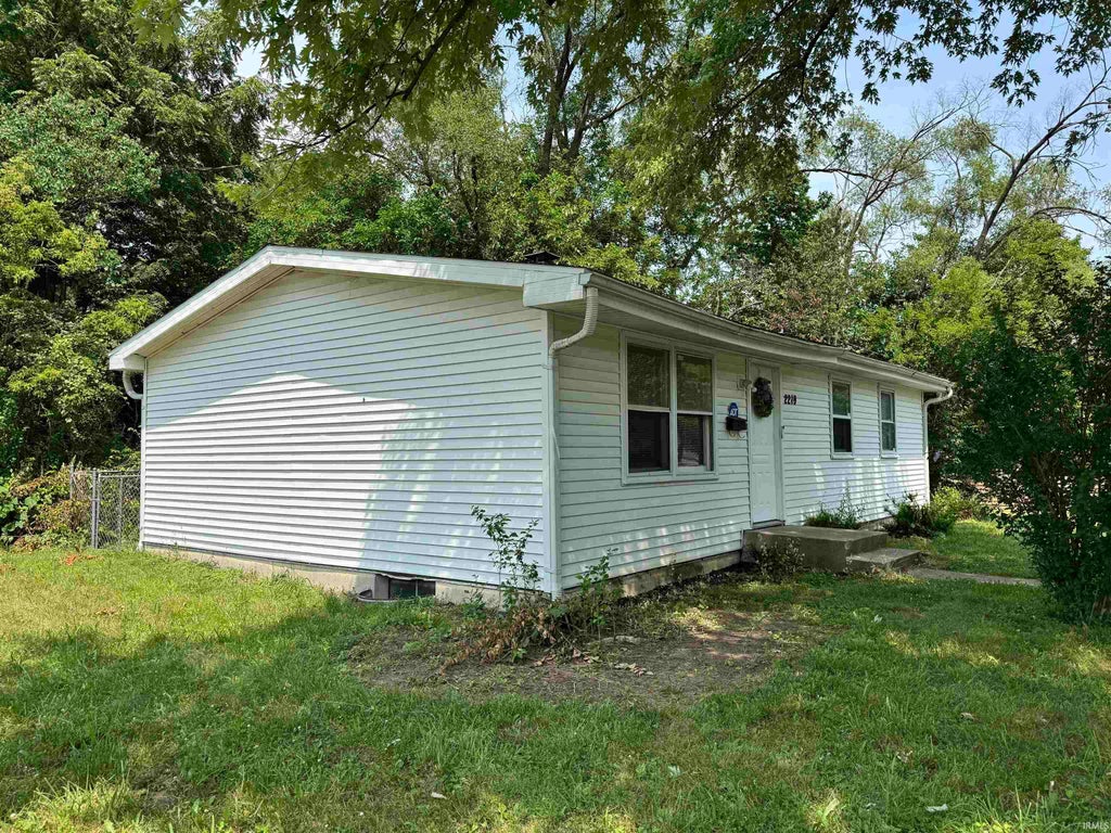 Photo of 2219 W Bulla Street, South Bend, IN 46628 (MLS # 202628412)