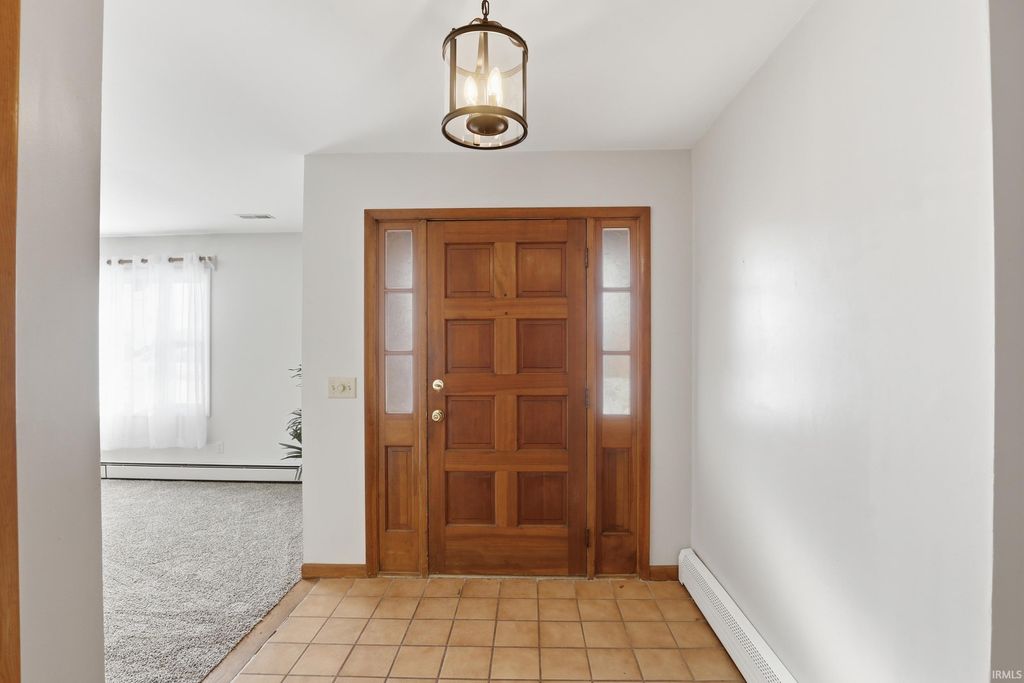 Photo of 4615 Fairlawn Pass, Fort Wayne, IN 46815 (MLS # 202548448)