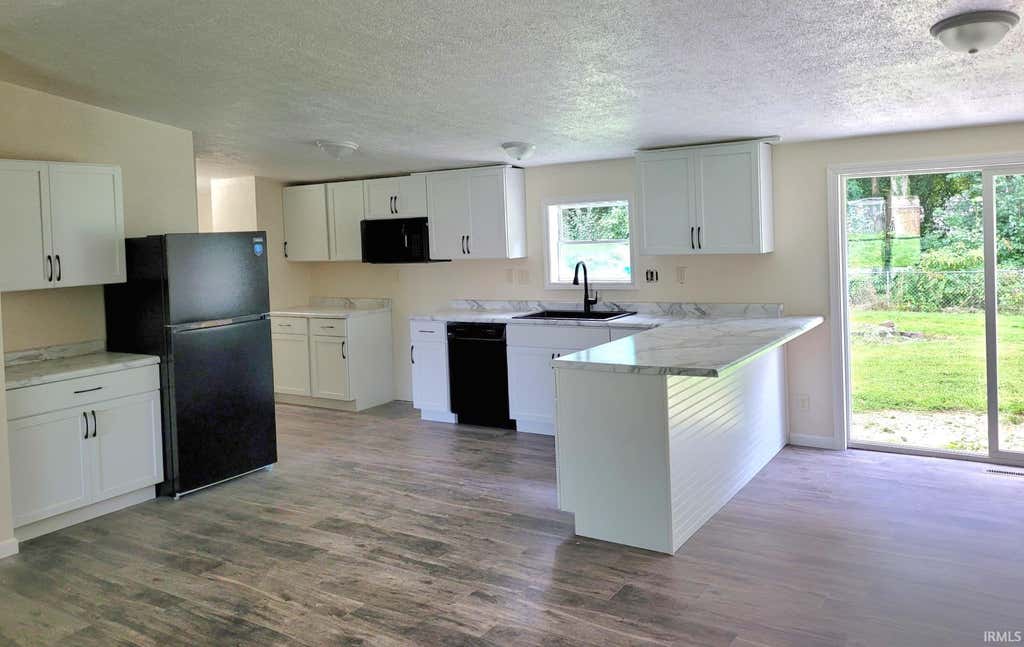 Photo of 30800 Oaksprings Drive, Granger, IN 46530 (MLS # 202634554)