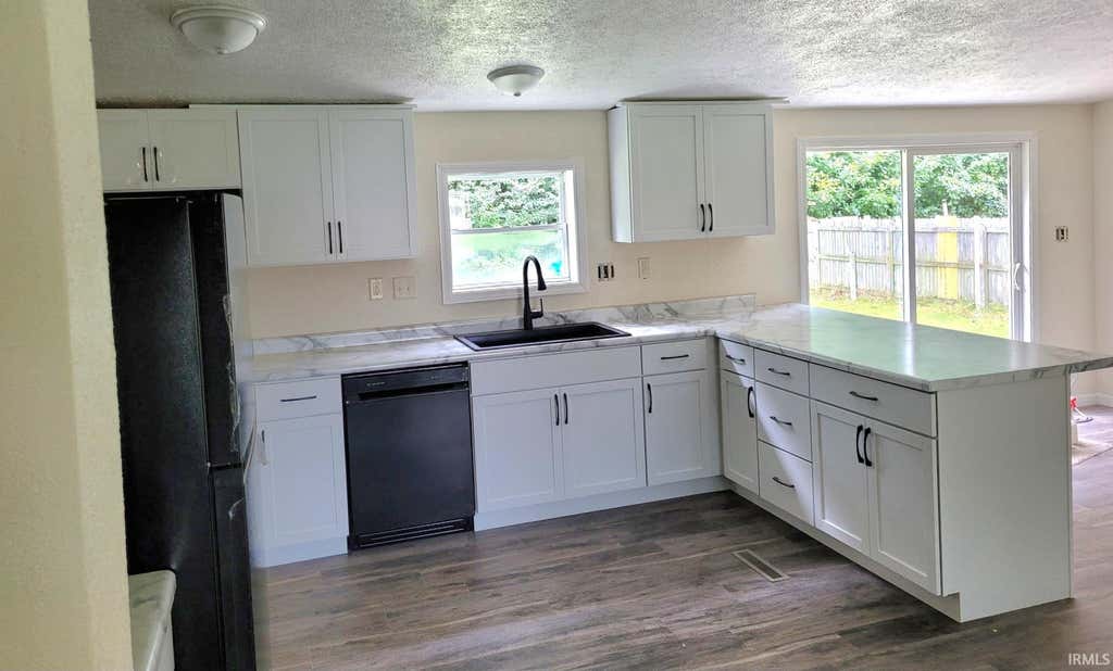 Photo of 30800 Oaksprings Drive, Granger, IN 46530 (MLS # 202634554)