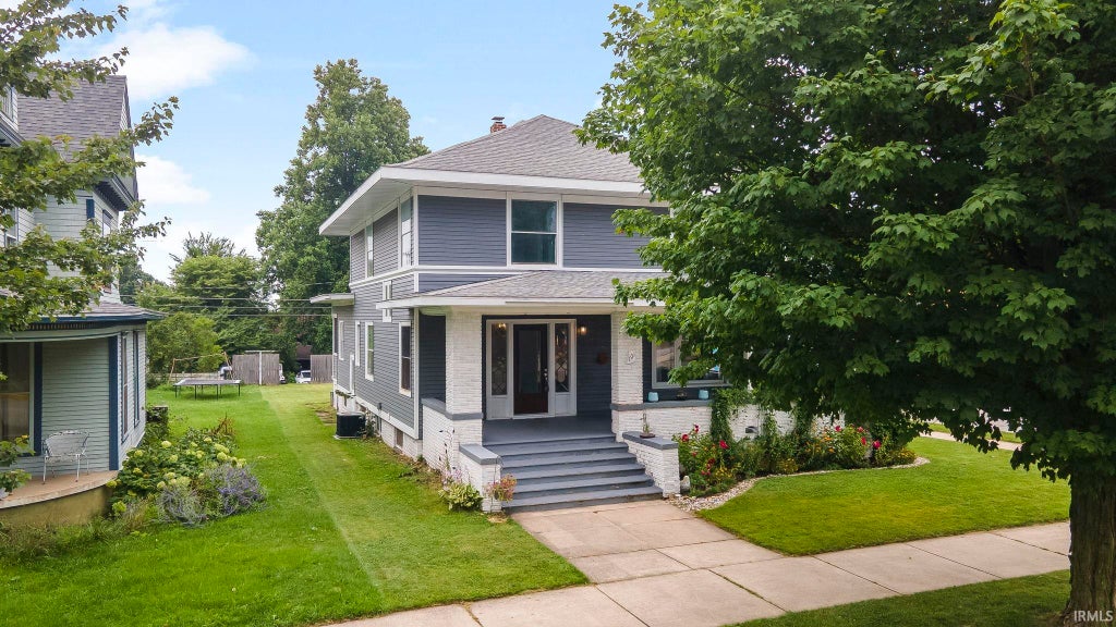 Photo of 101 W Michigan Street, New Carlisle, IN 46552 (MLS # 202633165)
