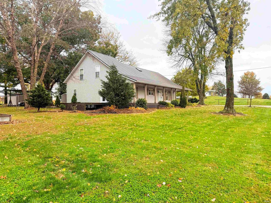 Photo of 103 N Main Street, Cannelburg, IN 47519 (MLS # 202545739)