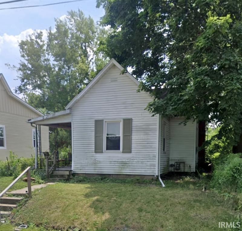 Photo of 319 W 10Th Street, Muncie, IN 47302 (MLS # 202629934)