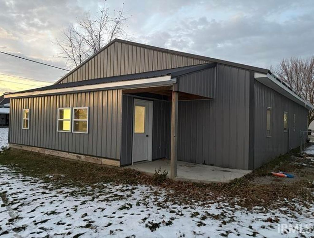 Photo of 207 E Walnut Street, Bryant, IN 47326 (MLS # 202545669)