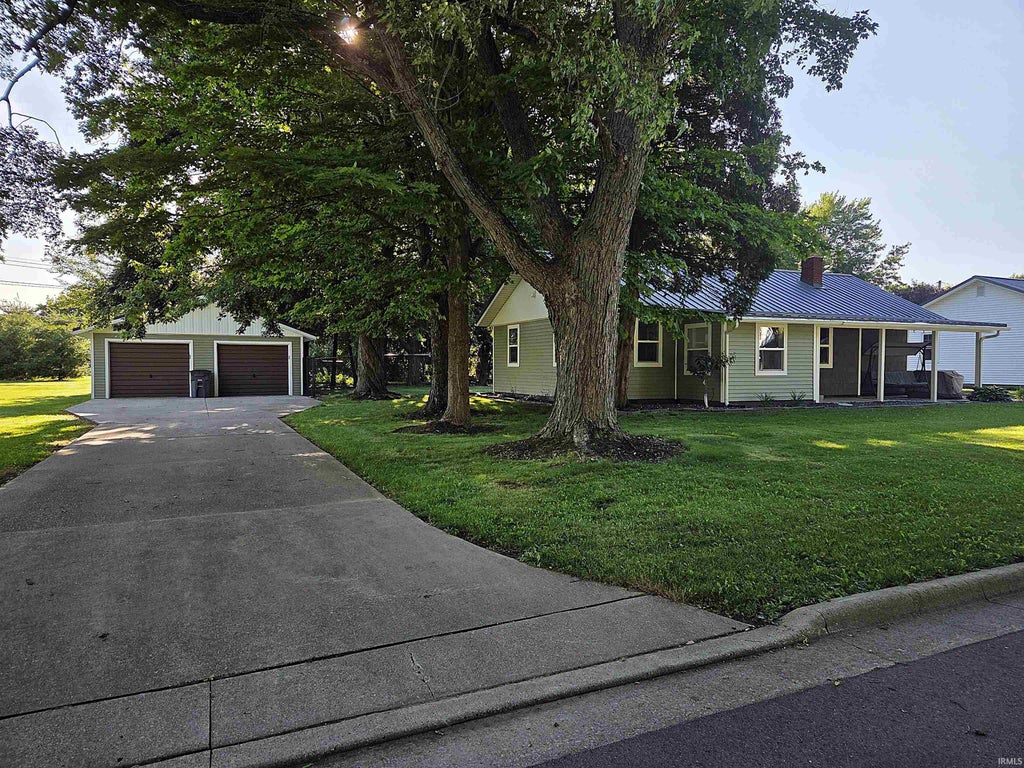 Photo of 205 S Washington Street, Wakarusa, IN 46573 (MLS # 202625646)