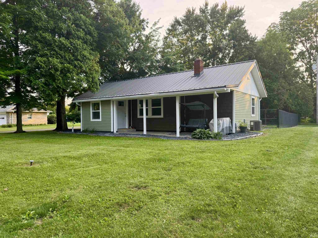 Photo of 205 S Washington Street, Wakarusa, IN 46573 (MLS # 202625646)
