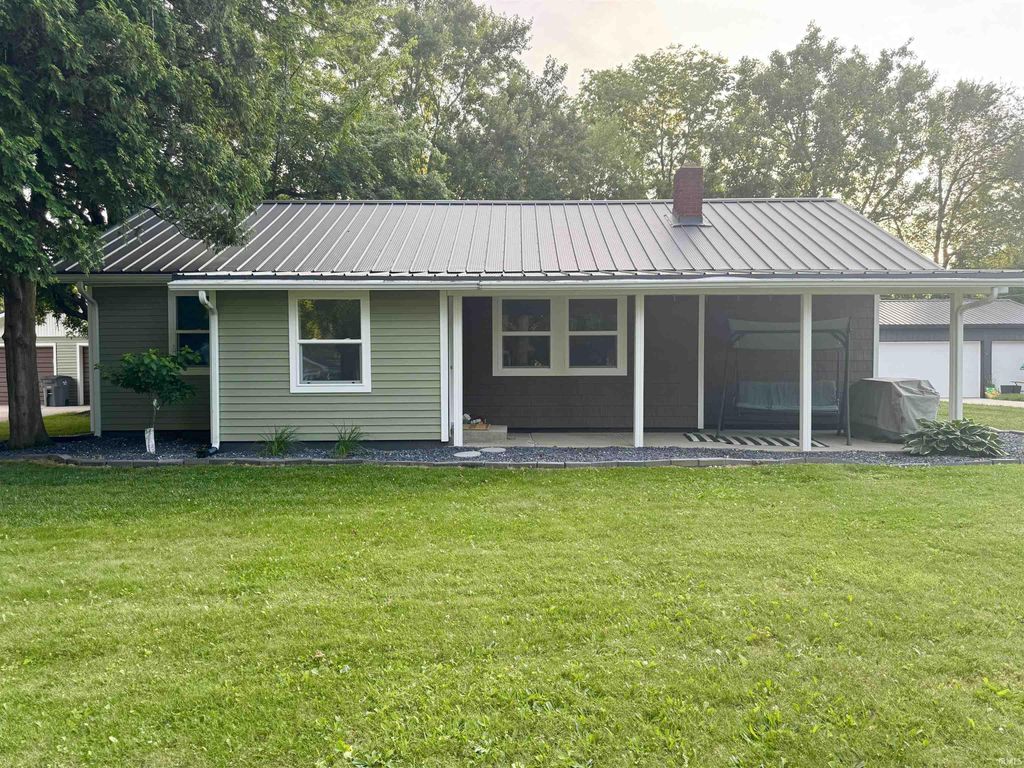Photo of 205 S Washington Street, Wakarusa, IN 46573 (MLS # 202625646)