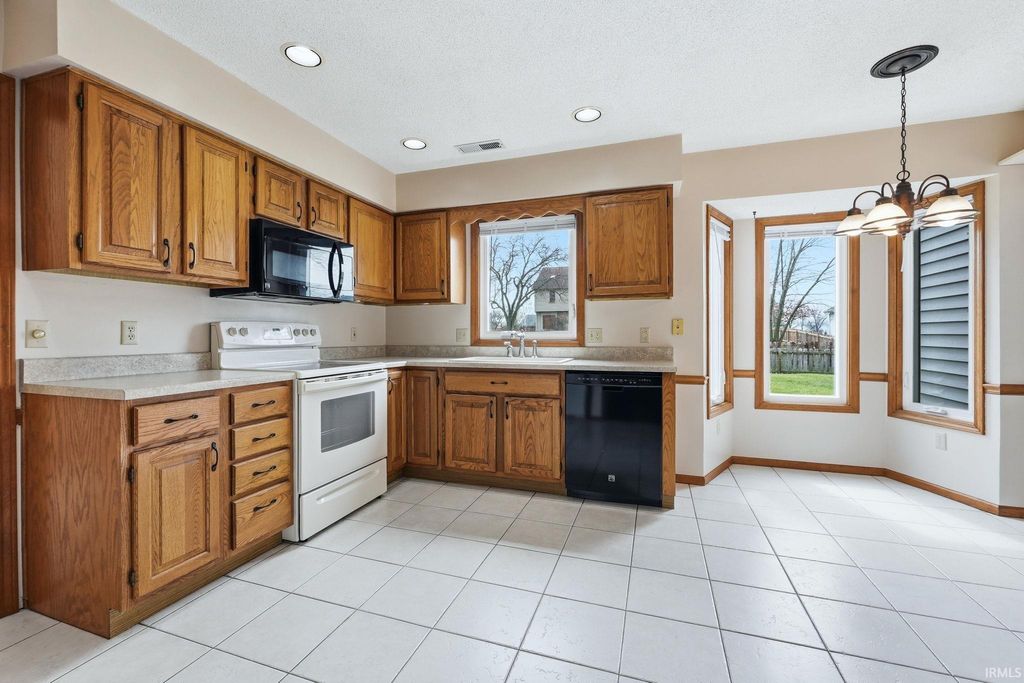 Photo of 3936 Sugarhill Run, New Haven, IN 46774 (MLS # 202611509)