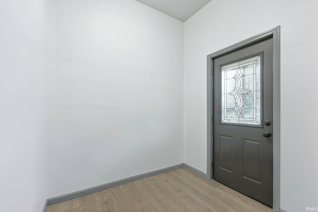 Photo of 202 W Central Avenue, Lagrange, IN 46761 (MLS # 202549417)