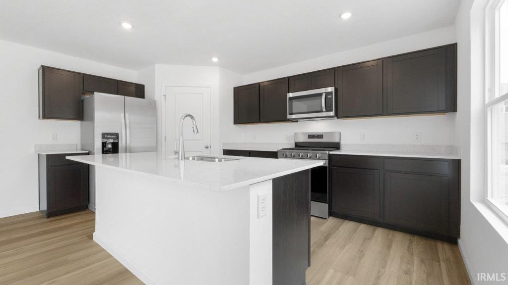 Photo of 966 Miller Woods Way, New Haven, IN 46774 (MLS # 202612472)