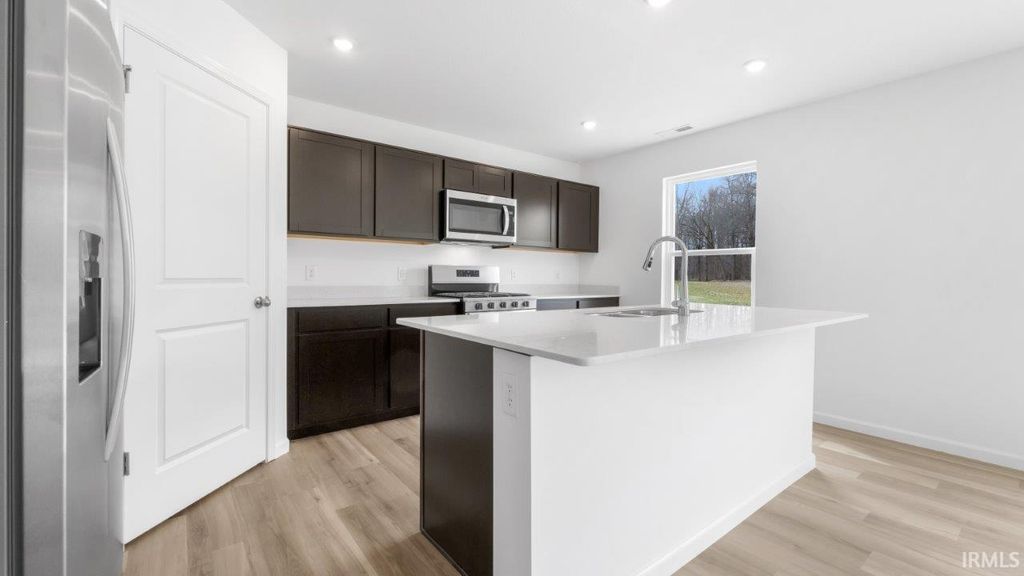 Photo of 966 Miller Woods Way, New Haven, IN 46774 (MLS # 202612472)