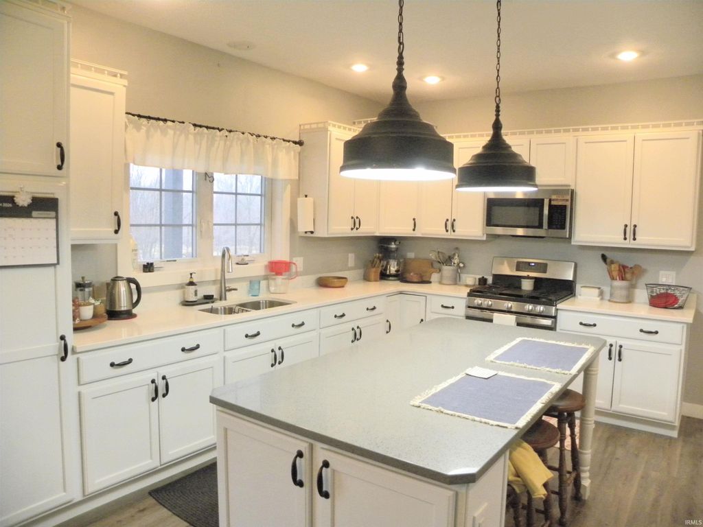 Photo of 3401 Mitten Road, Bowling Green, IN 47833 (MLS # 202607293)