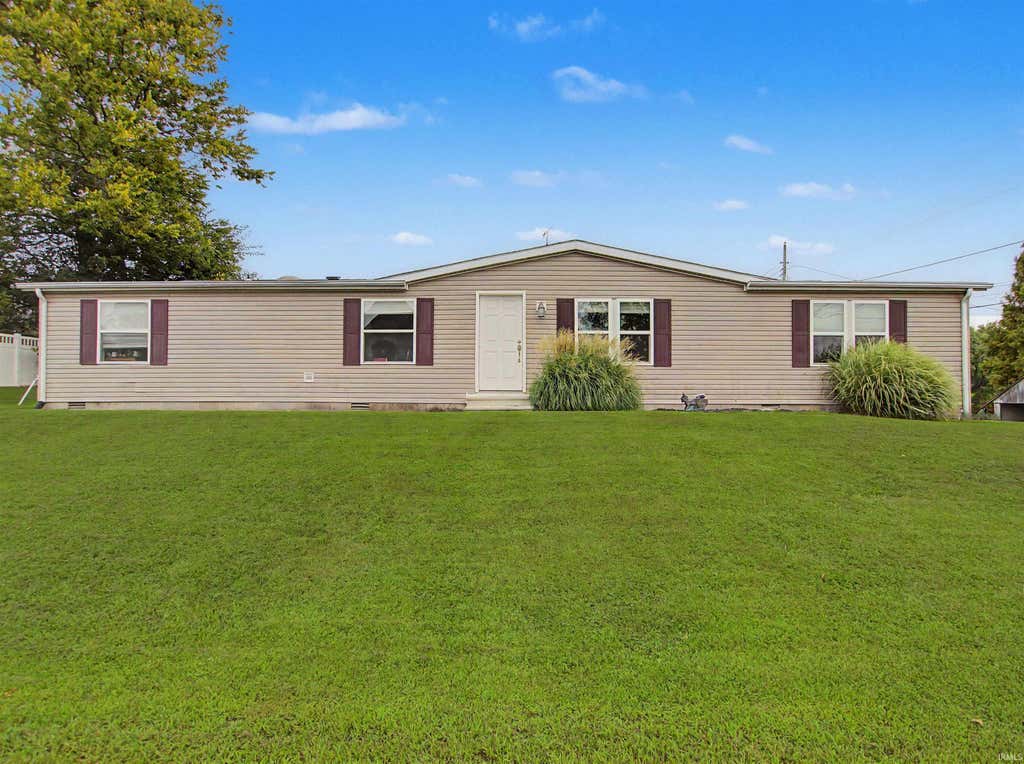 Photo of 305 Queen Street, Loogootee, IN 47553 (MLS # 202632869)