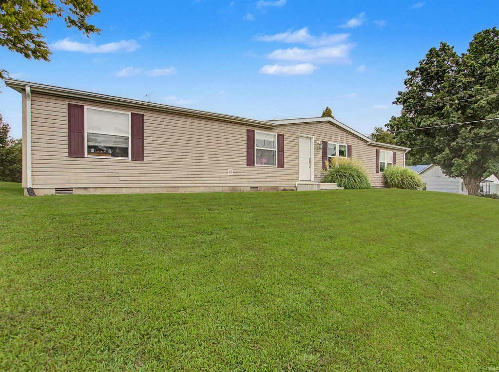 Photo of 305 Queen Street, Loogootee, IN 47553 (MLS # 202632869)