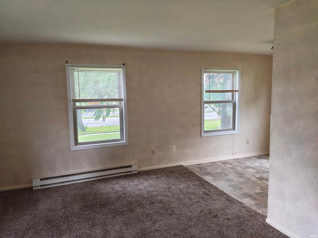 Photo of 180 W Shackley Street, Geneva, IN 46740 (MLS # 202625055)