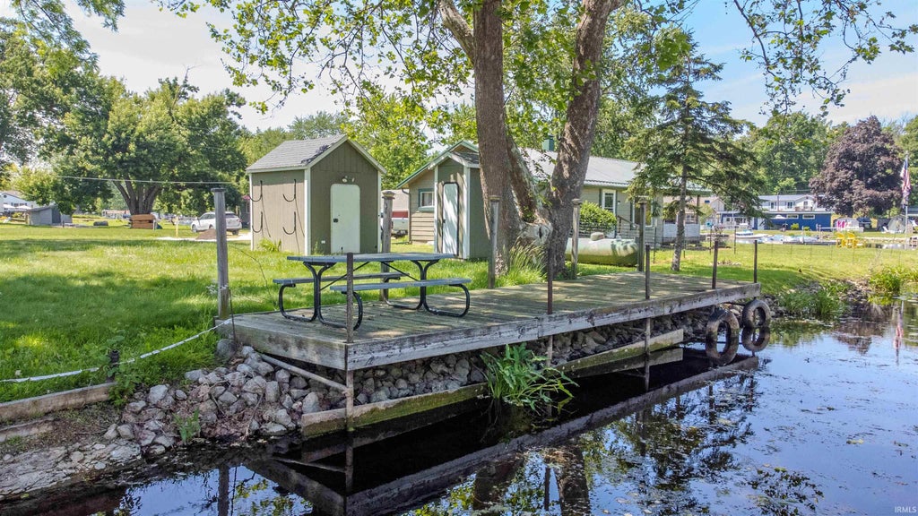 Photo of 80 W Messick LK. Road #13, Wolcottville, IN 46795 (MLS # 202621985)
