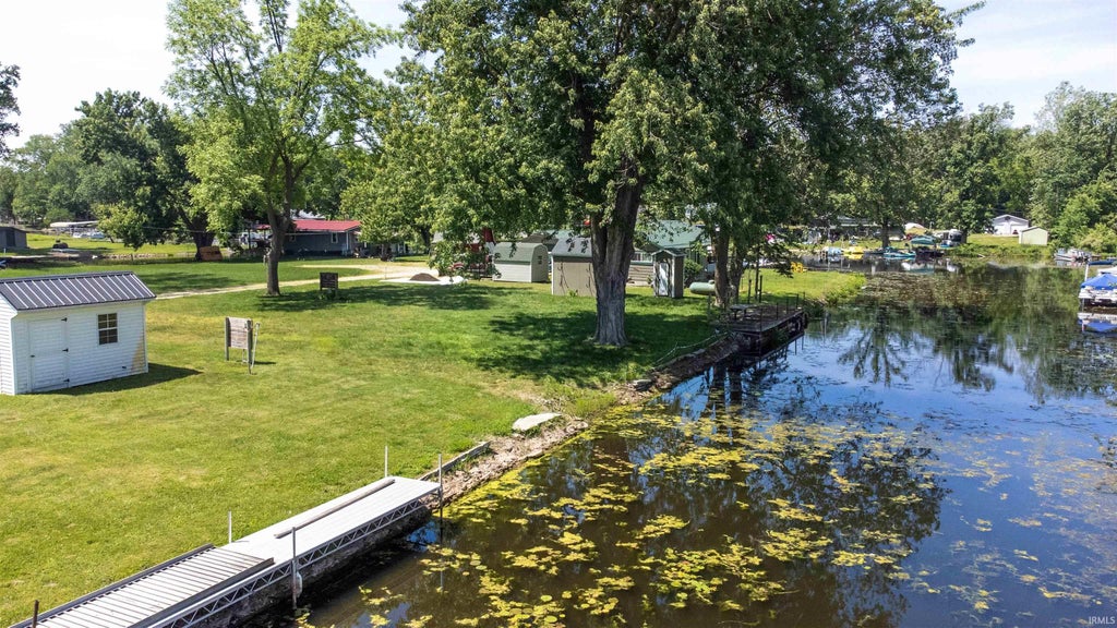 Photo of 80 W Messick LK. Road #13, Wolcottville, IN 46795 (MLS # 202621985)