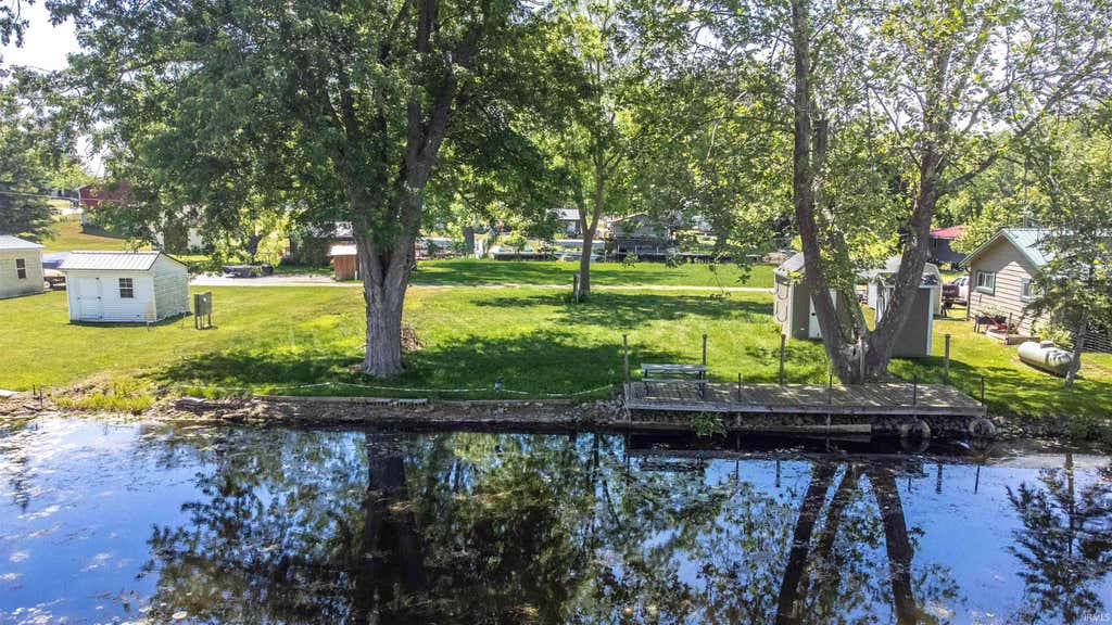 Photo of 80 W Messick LK. Road #13, Wolcottville, IN 46795 (MLS # 202621985)