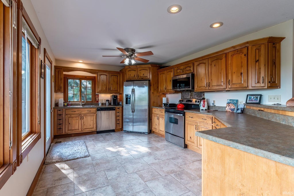 Photo of 240 W Bellefontaine Road, Pleasant Lake, IN 46779 (MLS # 202638961)