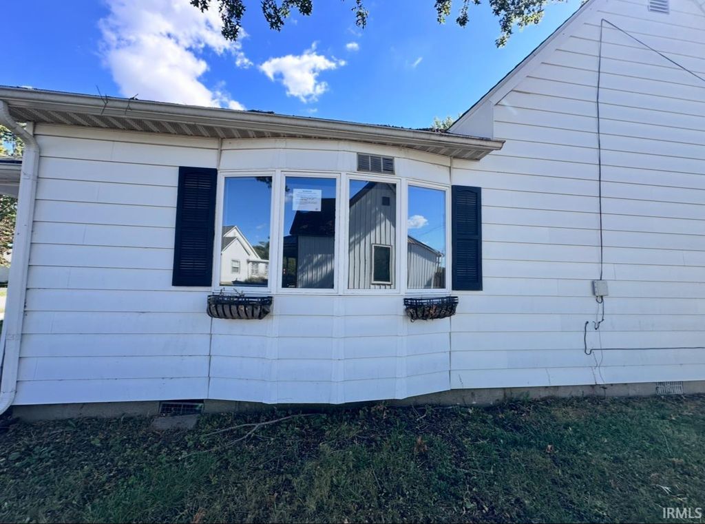Photo of 212 E Hopewell Street, Farmersburg, IN 47850 (MLS # 202546825)
