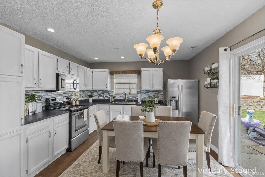 Photo of 447 S Woodfield Lane, Bloomington, IN 47403 (MLS # 202607890)